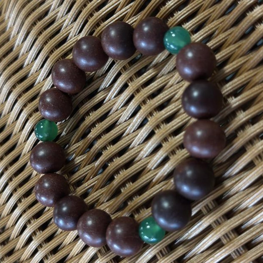 Fire · Warm Radiance bracelet, brown beads with green accents